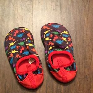 Never worn dinosaur water shoes size 5/6